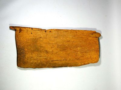 a piece of wood that has been cut in half