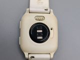a close up of a watch on a table
