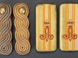 three different types of wooden ties with a crown on them