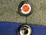 a close up of a hat with buttons on it