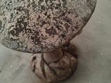 a small mushroom sitting on top of a table