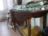 a table with a mirror on top of it in a room