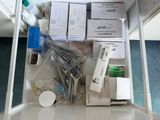a drawer full of medical supplies on the floor