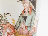 a white vase with a painting of a man on it