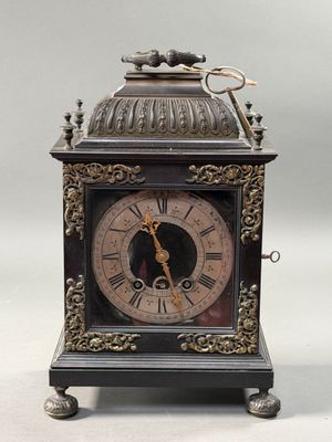 a clock that is sitting on top of a table