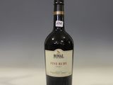 a bottle of wine that is sitting on a table