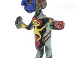 statue of a person with a blue helmet and a green body