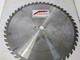 a picture of a circular saw blade on a piece of wood