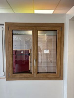 a small window in the corner of a room