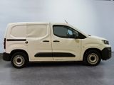 a picture of a white van parked in a garage