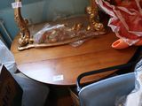 a small table with a mirror on top of it