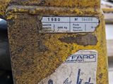 a close up of a parking meter with a sticker on it