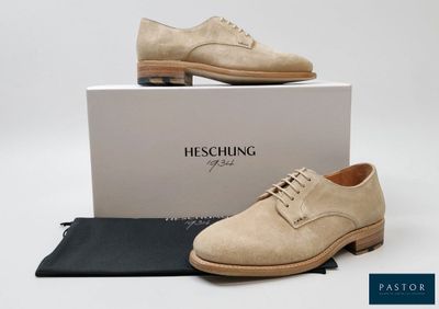 a close up of a pair of shoes on a box