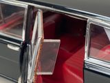 a close up of a car with a red seat in it