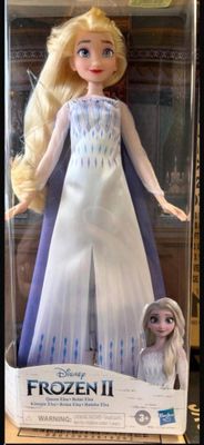 disney ' s frozen 2 elsa doll with blonde hair and blue dress
