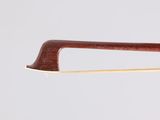 a close up of a violin bow on a white background