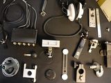 a lot of electronics that are laying out on the table