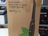 une boîte sur laquelle est posé un aspirateur