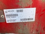 a close up of a red motorcycle with a barcode on it