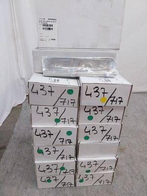 many boxes with numbers on them stacked on top of each other