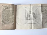 an open book with a drawing of a man on it