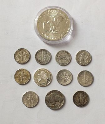 a lot of coins that are sitting on a table