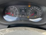 a close up of a car dashboard with a speedometer and gauges