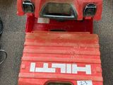 a red tool box with a red handle and a black handle