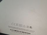 a close up of a laptop with a barcode on it