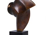 an image of a bronze sculpture of a head on a black base