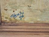 an image of a close up of a painting on a wooden surface