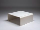 an image of a white coffee table on a grey background