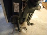 a close up of a machine that is sitting on the floor