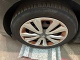 a close up of a tire on the ground