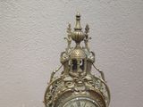 a clock that is sitting on top of a table