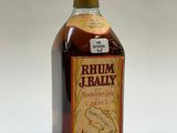 an image of a bottle of alcohol sitting on top of a table