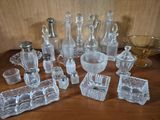 a table with a lot of glass items on it