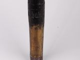 a black and gold baseball bat on a white surface
