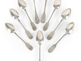 a lot of spoons and forks arranged in a circle