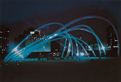 a picture of a city at night with blue lights