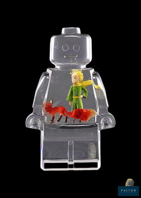 a lego figure with a red fox in the middle of it