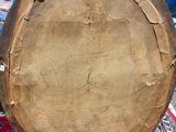 a large piece of wood sitting on top of a rug