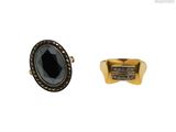 une image représentant une bague et une bague sertie d'une pierre noire