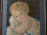 painting of a baby holding a sheep in a frame on a wall