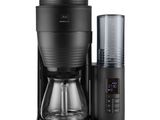 a close up of a coffee maker on a white background