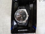 a watch that is in a box on a table