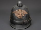 an old german helmet with an eagle emblem on it