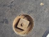 a close up of a skateboard with a hole in it