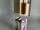 a box with a lighter and a cigarette in it