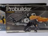 the box is open to show the model of a helicopter